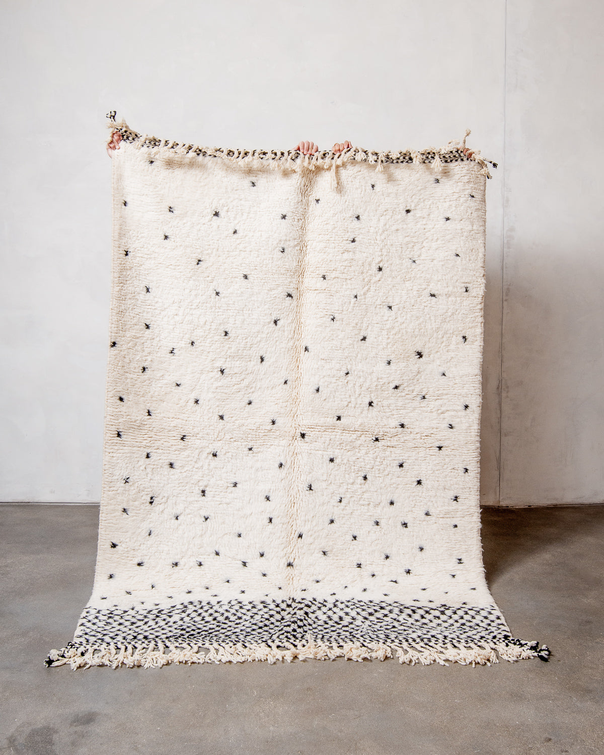 Modern, designer, handcrafted Berber rug from Morocco. Beniourain carpet with beautiful colours and patterns and fluffy wool texture.